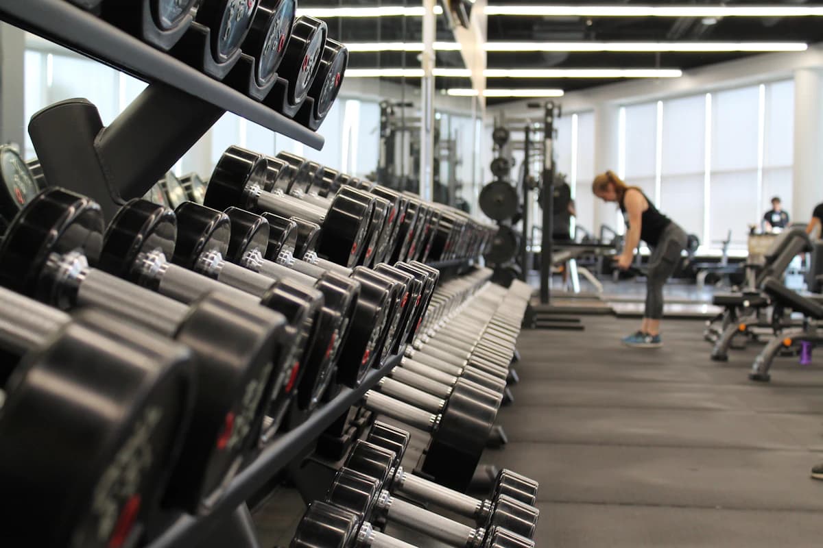 Best Shopify themes for fitness and gym stores 2026 showing dark bold designs for activewear brands